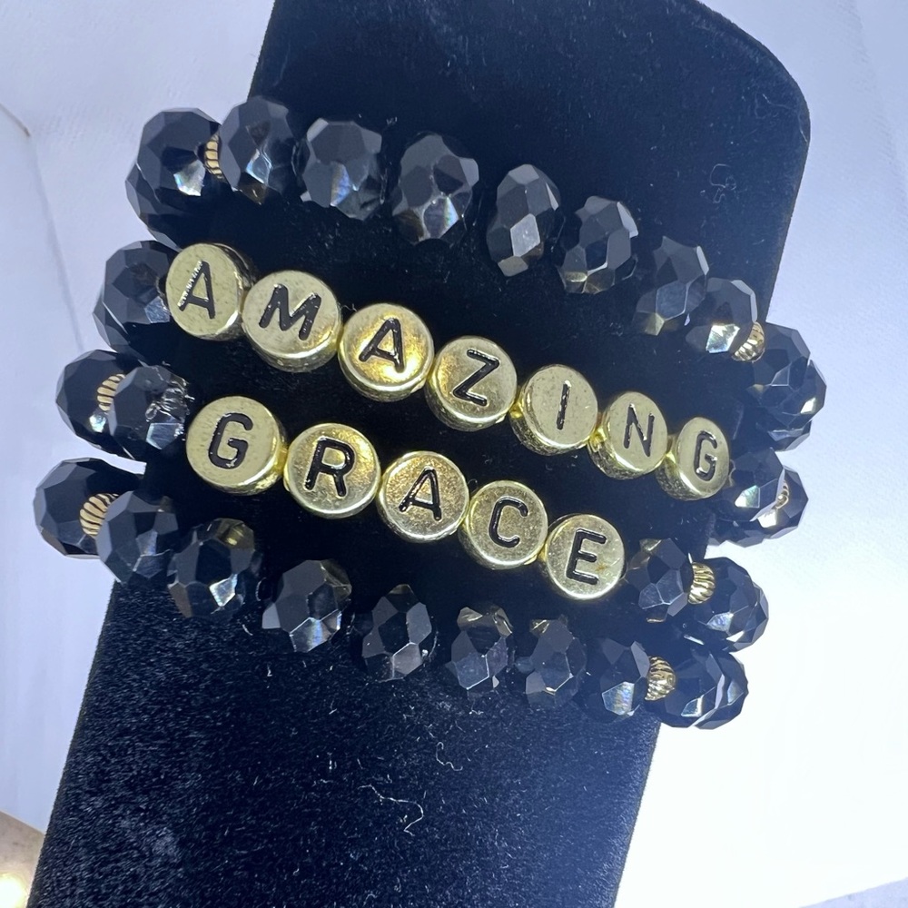 Beautiful, set of four stretchy “Amazing Grace” bracelets.